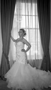 Bride backlit in a Window