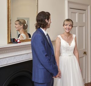 bride and groom with mirror reflection