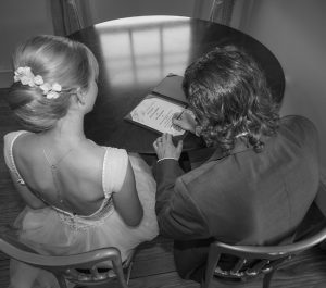 bride and groom signing